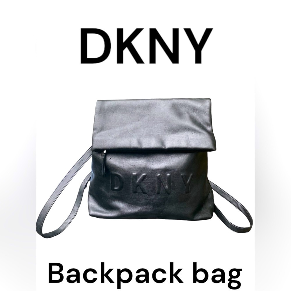 DKNY-black pvc backpack/bag. Interior perfect/outside has small picks/scratches.